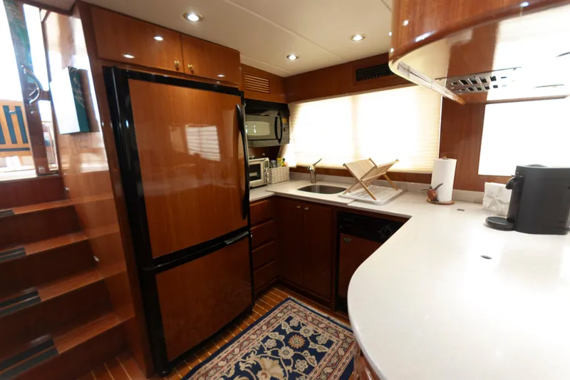 Slide: The Image of Luxurious kitchen interior of 2007 Novatec 55 Islander CPMY yacht with modern amenities. - 32
