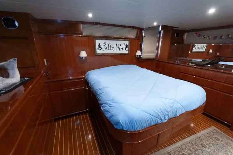Slide: The Image of Luxurious bedroom interior of 2007 Novatec 55 Islander CPMY yacht with wooden finish. - 34