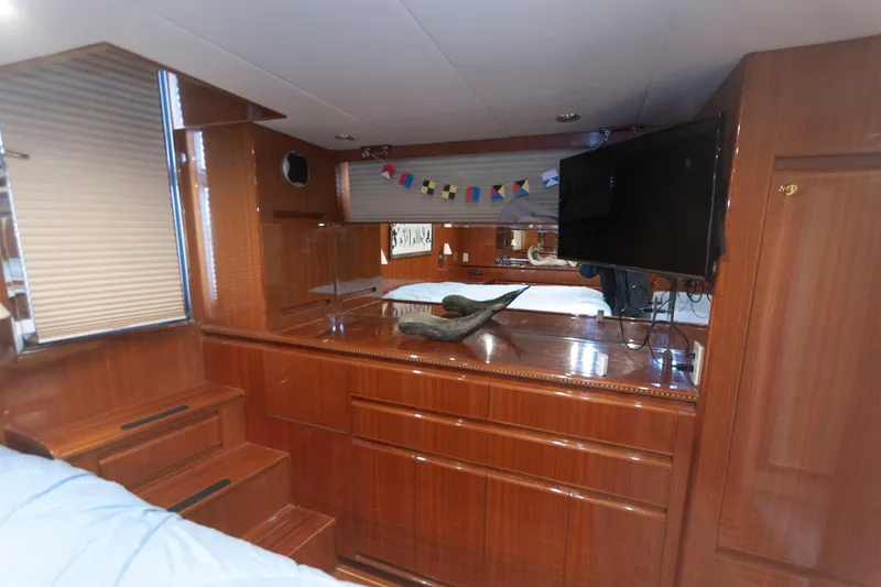 Slide: The Image of Luxurious interior of 2007 Novatec 55 Islander CPMY yacht with wood finish and TV. - 37
