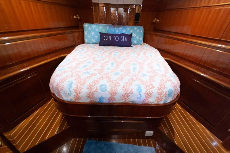 Slide: The Image of Luxurious bedroom in 2007 Novatec 55 Islander CPMY yacht with nautical-themed bedding. - 39