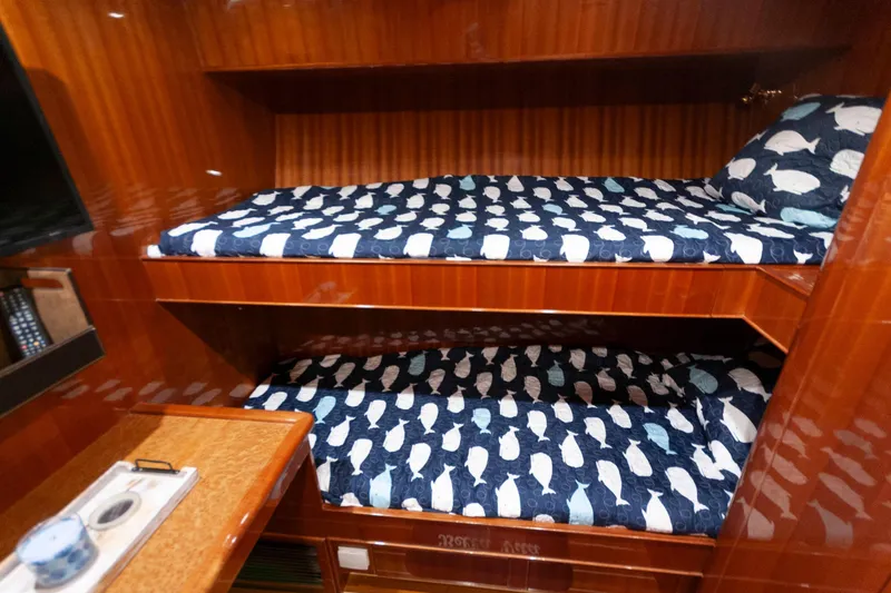 Slide: The Image of Bunk beds with fish-patterned bedding in 2007 Novatec 55 Islander CPMY yacht cabin. - 40