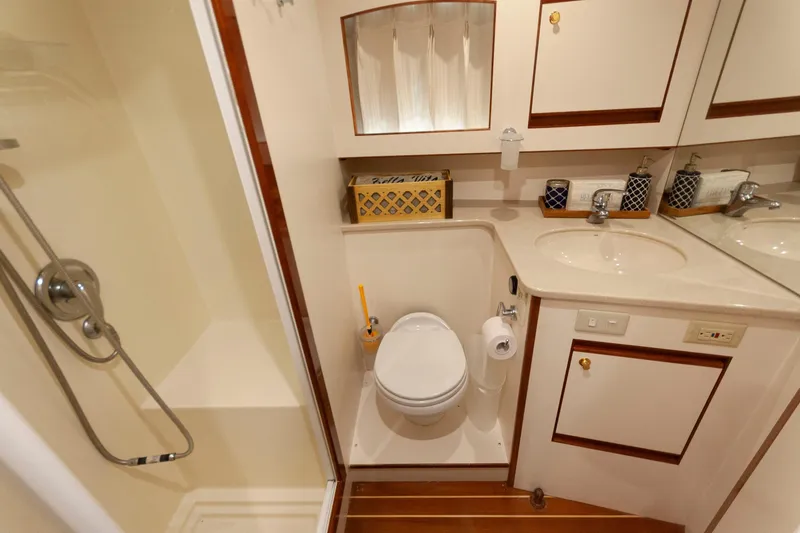 Slide: The Image of Bathroom interior of 2007 Novatec 55 Islander CPMY yacht, featuring shower, toilet, and sink. - 41