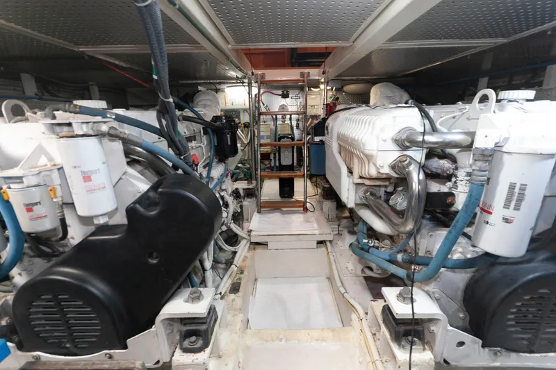 Slide: The Image of Engine room of 2007 Novatec 55 Islander CPMY yacht, showcasing dual engines and mechanical components. - 42