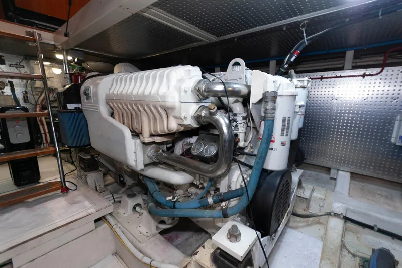 Slide: The Image of Engine room of 2007 Novatec 55 Islander CPMY yacht, featuring a powerful marine engine. - 45
