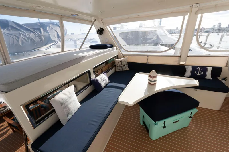 Slide: The Image of Luxurious interior of 2007 Novatec 55 Islander CPMY yacht with comfortable seating and nautical decor. - 7