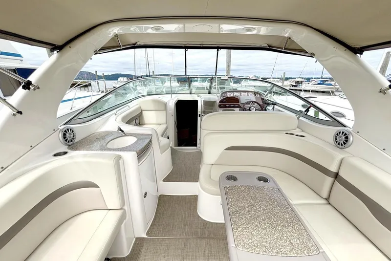 Slide: The Image of 2008 Chaparral Signature 330 boat interior with luxurious seating and modern amenities. - 4