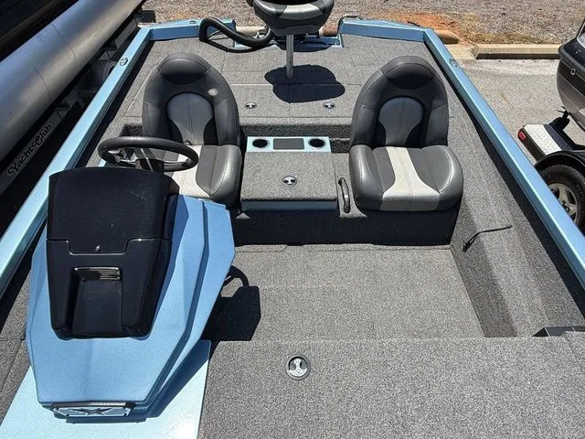 Slide: The Image of 2021 Vexus AVX1880 boat interior with dual seats and steering console. - 12