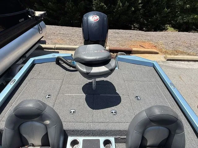 Slide: The Image of 2021 Vexus AVX1880 boat interior with seating and carpeted deck. - 13