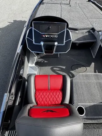 Slide: The Image of 2024 Vexus VXS20 boat interior with red and gray seating, modern dashboard design. - 7