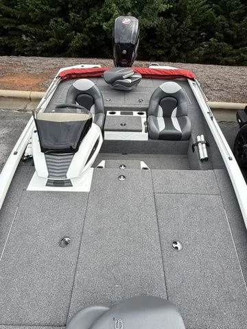 Slide: The Image of 2022 Vexus AVX1880 boat with dual seats and modern dashboard design. - 12