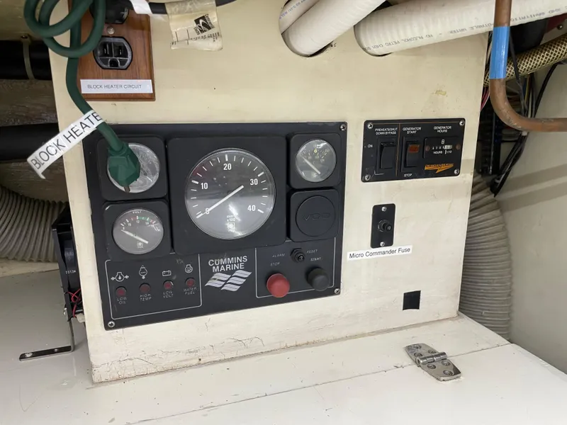 Slide: The Image of Control panel of a 1991 TransWorld Fantail 50 Motor Yacht with Cummins Marine gauges. - 33