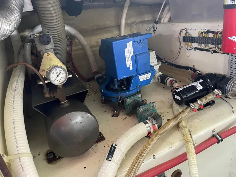 Slide: The Image of Engine room of 1991 TransWorld Fantail 50 Motor Yacht with mechanical components and wiring. - 38