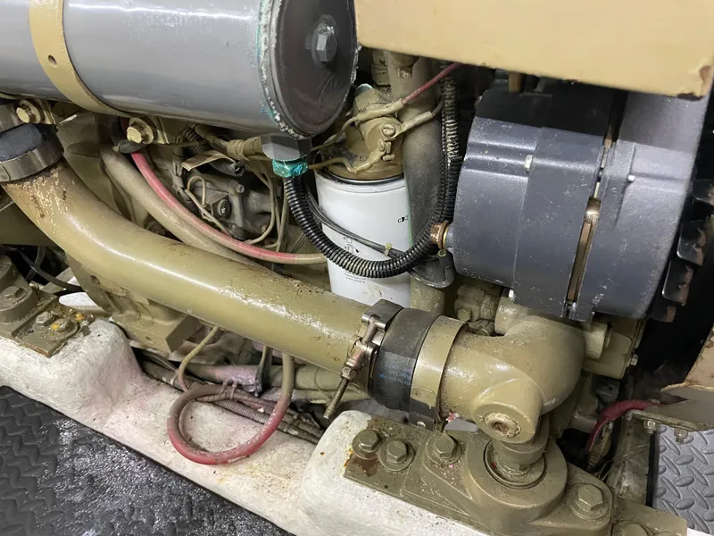 Slide: The Image of Engine components of a 1991 TransWorld Fantail 50 Motor Yacht, showcasing mechanical details. - 39