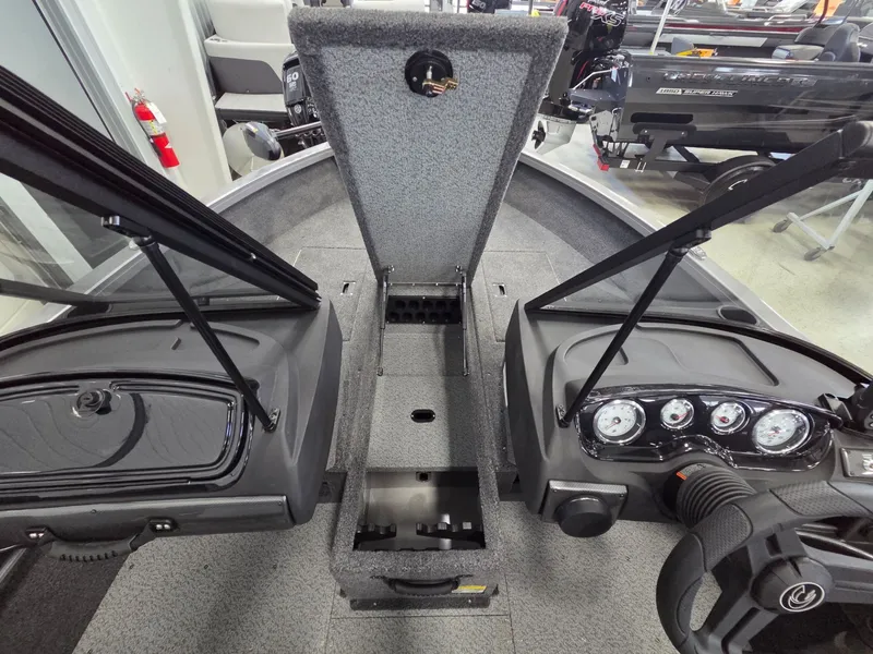 Slide: The Image of Interior view of 2026 Crestliner 1650 Hawk boat with dashboard. - 11