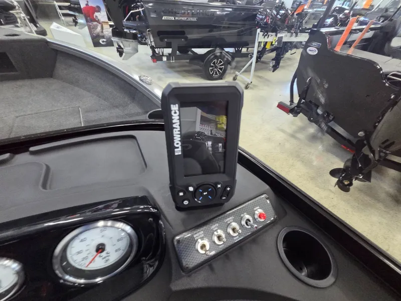 Slide: The Image of Crestliner 1650 Hawk 2026 with Lowrance fish finder and dashboard. - 16