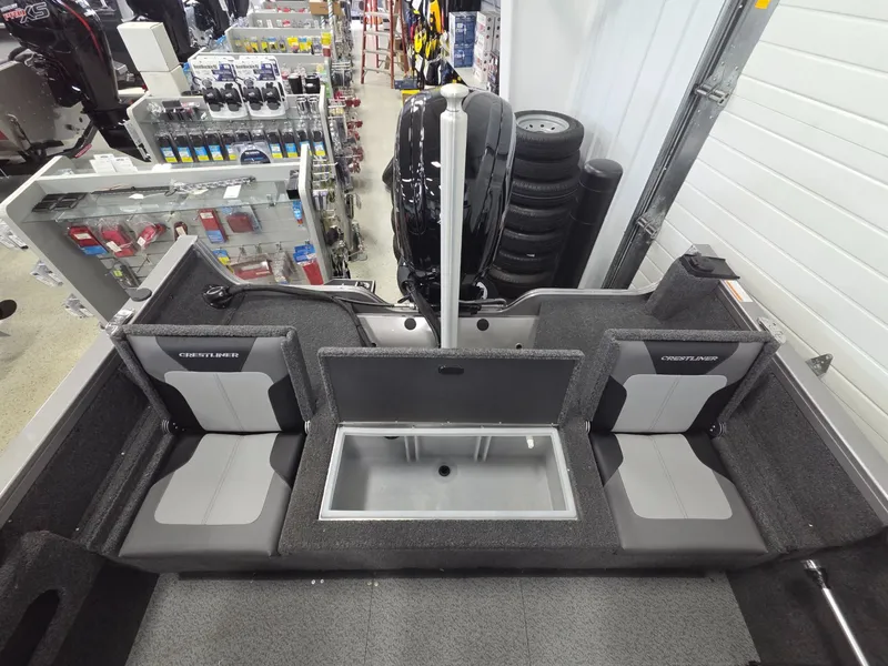 Slide: The Image of Interior view of 2026 Crestliner 1650 Hawk with seating and storage. - 18