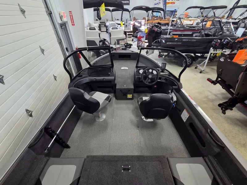 Slide: The Image of Interior view of 2026 Crestliner 1650 Hawk boat in showroom. - 20