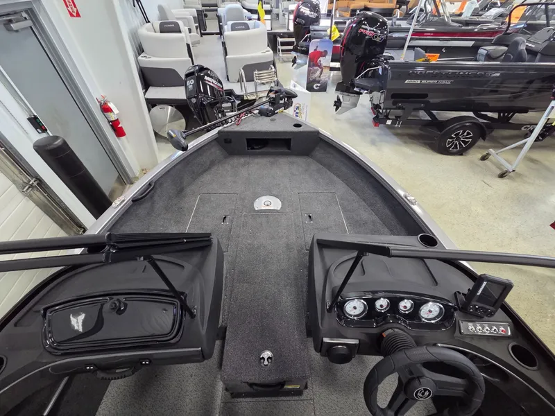 Slide: The Image of Interior view of 2026 Crestliner 1650 Hawk boat in showroom. - 9