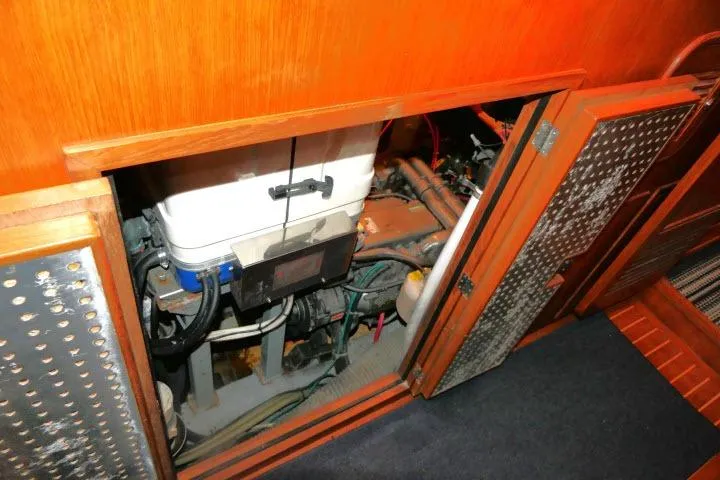 Slide: The Image of Engine compartment of 2002 Tayana 460 Vancouver Pilothouse yacht, showcasing mechanical components. - 21