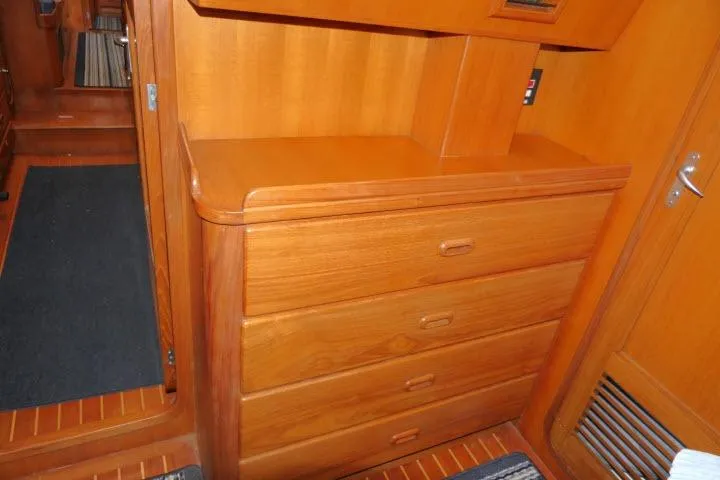 Slide: The Image of Wooden interior of 2002 Tayana 460 Vancouver Pilothouse with drawers and door. - 28