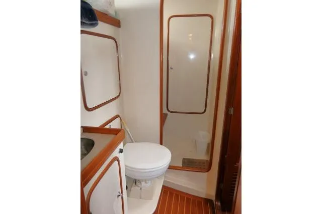 Slide: The Image of Bathroom in 2002 Tayana 460 Vancouver Pilothouse yacht with shower and toilet. - 29