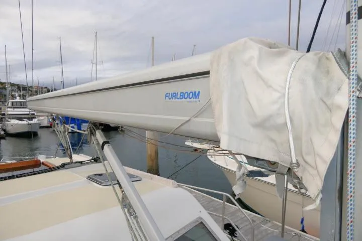 Slide: The Image of Tayana 460 Vancouver Pilothouse 2002 sailboat with Furlboom system in marina. - 60