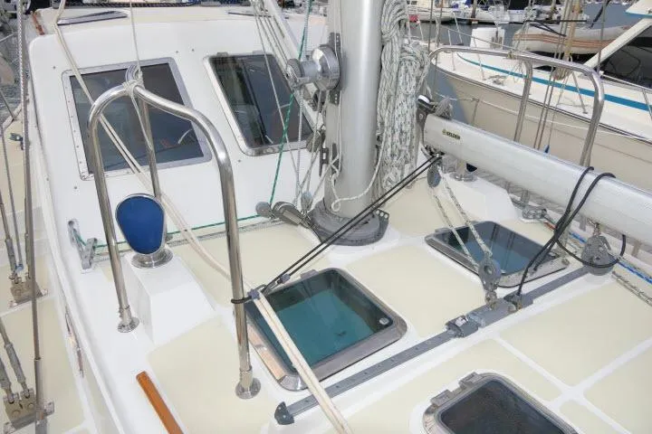 Slide: The Image of 2002 Tayana 460 Vancouver Pilothouse deck with hatches and rigging details. - 62