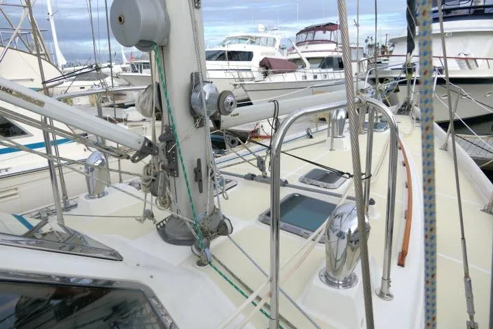 Slide: The Image of Deck view of 2002 Tayana 460 Vancouver Pilothouse yacht in marina. - 63