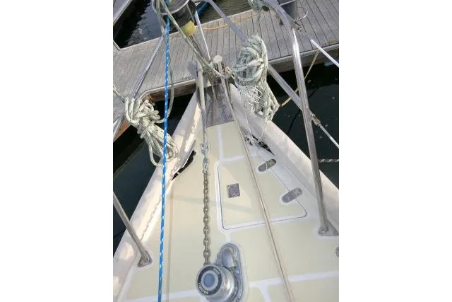 Slide: The Image of Bow of 2002 Tayana 460 Vancouver Pilothouse sailboat with ropes and anchor chain. - 65