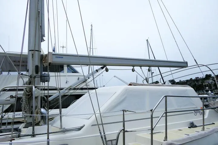 Slide: The Image of 2002 Tayana 460 Vancouver Pilothouse sailboat docked at a marina. - 68
