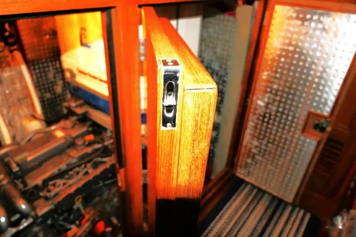 Slide: The Image of Interior view of 2002 Tayana 460 Vancouver Pilothouse, showcasing wooden cabinetry and engine room. - 72