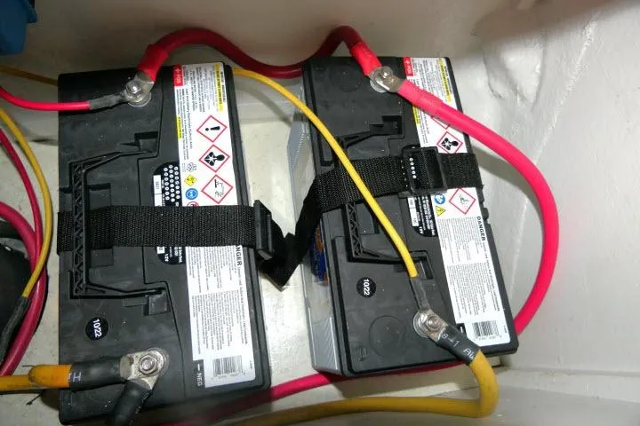 Slide: The Image of Batteries with cables in a 2002 Tayana 460 Vancouver Pilothouse yacht. - 76