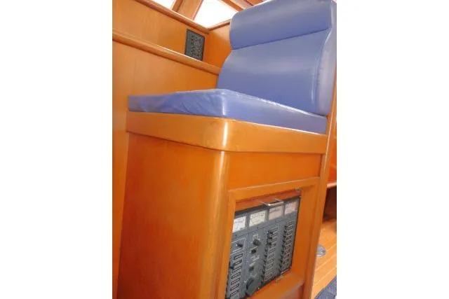 Slide: The Image of Pilothouse seating with control panel on 2002 Tayana 460 Vancouver yacht. - 8