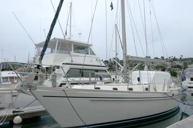 Slide: The Image of 2002 Tayana 460 Vancouver Pilothouse sailboat docked at marina. - 84