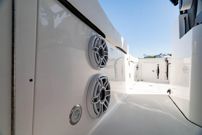 Slide: The Image of 2022 Crevalle 33 CSF boat interior with speakers and sleek design. - 37