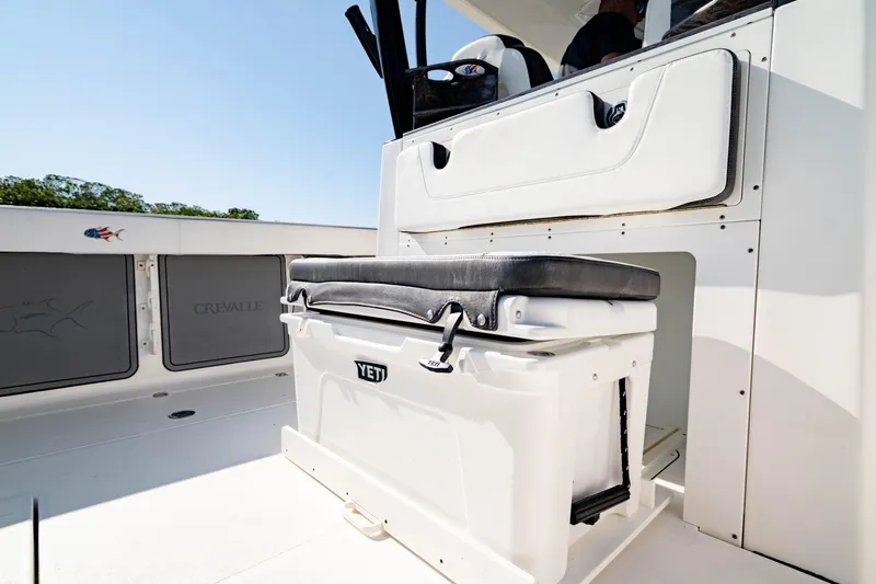 Slide: The Image of 2022 Crevalle 33 CSF boat interior with YETI cooler and seating. - 44