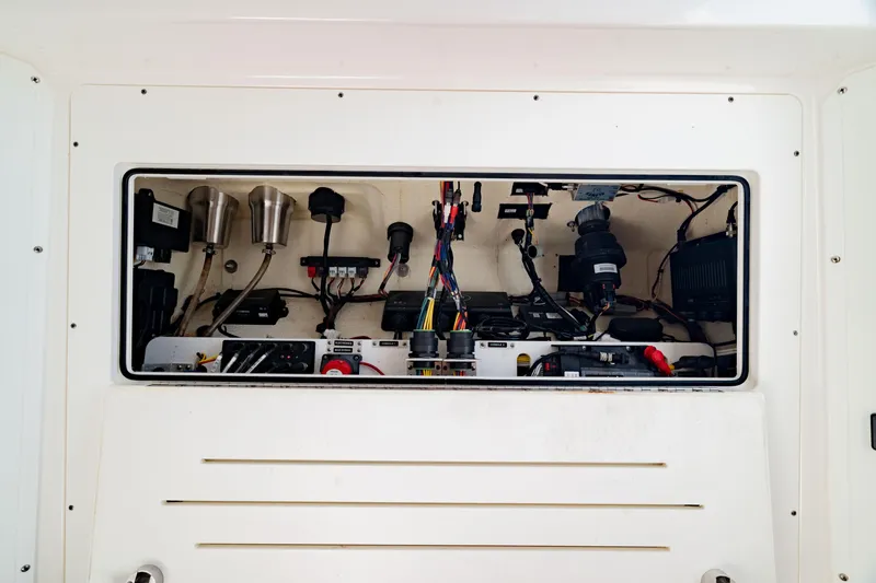 Slide: The Image of 2022 Crevalle 33 CSF boat electrical panel with wiring and components. - 58