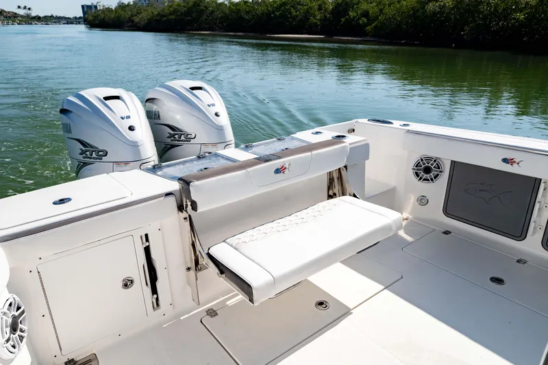 Slide: The Image of 2022 Crevalle 33 CSF boat with Yamaha XTO engines on calm water. - 6