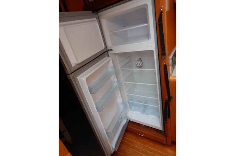 Slide: The Image of Stainless steel stove in 1988 Camargue 48 Cockpit Motor Yacht kitchen. - 28