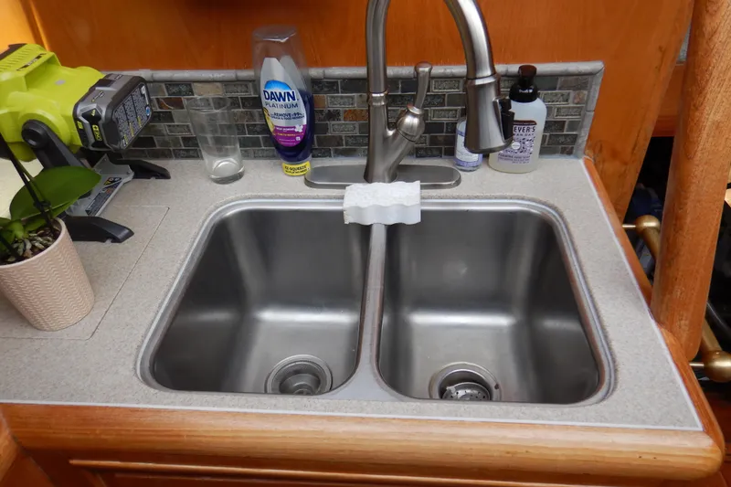 Slide: The Image of Fridge inside 1988 Camargue 48 Cockpit Motor Yacht, wooden interior. - 30