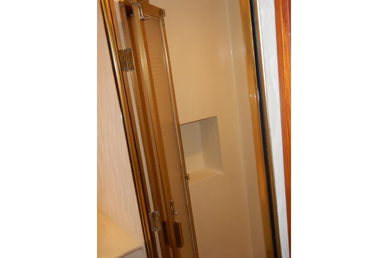 Slide: The Image of Shower area in 1988 Camargue 48 Cockpit Motor Yacht with glass door. - 46