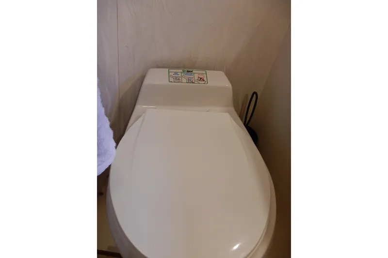 Slide: The Image of Toilet in 1988 Camargue 48 Cockpit Motor Yacht bathroom. - 47