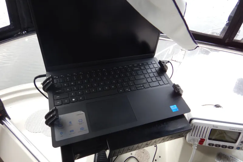 Slide: The Image of Raymarine control panel on 1988 Camargue 48 Cockpit Motor Yacht. - 58