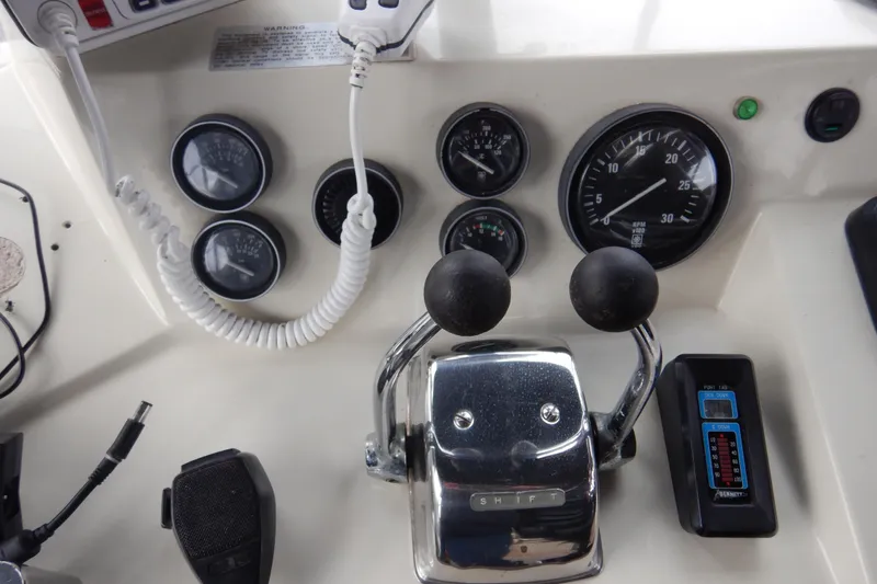 Slide: The Image of VHF marine radio on 1988 Camargue 48 Cockpit Motor Yacht dashboard. - 61