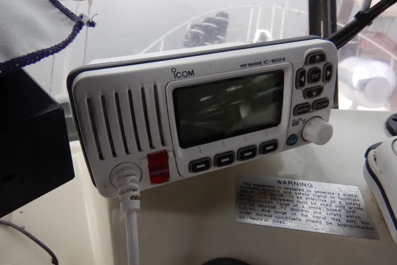 Slide: The Image of Interior view from 1988 Camargue 48 Cockpit Motor Yacht, overlooking rainy marina scene. - 63