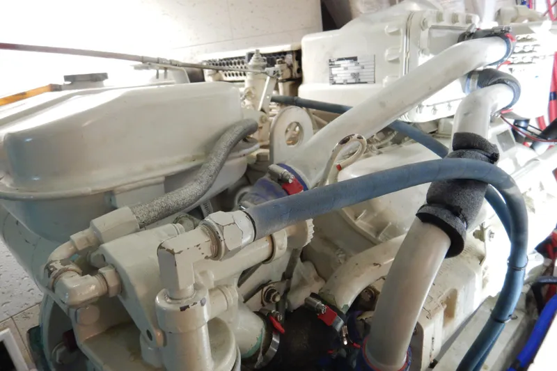 Slide: The Image of Fire extinguisher and container in 1988 Camargue 48 Cockpit Motor Yacht engine room. - 72