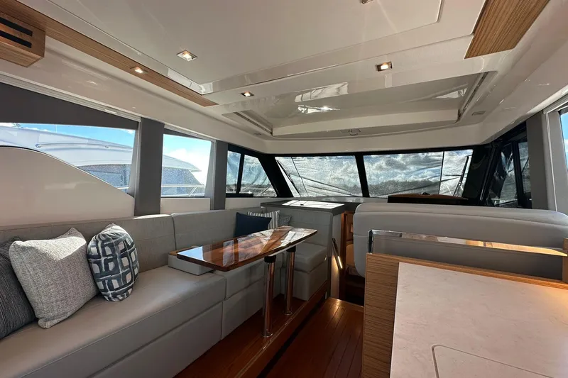 Slide: The Image of Luxurious interior of 2023 Tiara Yachts C39 Coupe with modern seating and elegant design. - 13