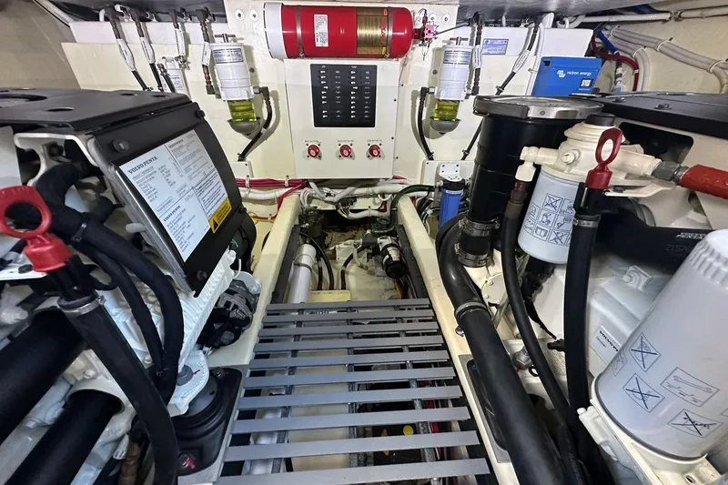 Slide: The Image of Engine room of 2023 Tiara Yachts C39 Coupe, featuring advanced mechanical systems. - 8