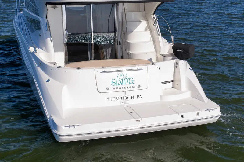 Slide: The Image of 2012 Meridian 441 Sedan yacht on water, rear view, Pittsburgh registration. - 23