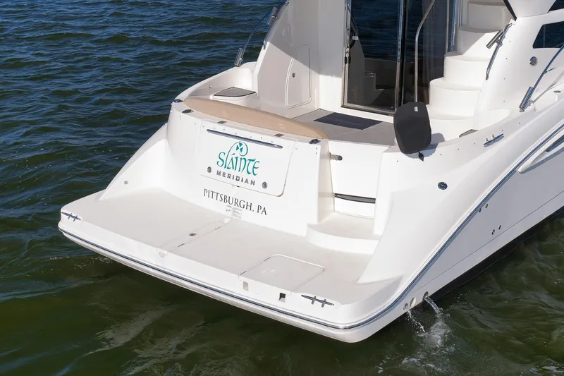 Slide: The Image of 2012 Meridian 441 Sedan yacht on water, rear view with Pittsburgh, PA registration. - 24